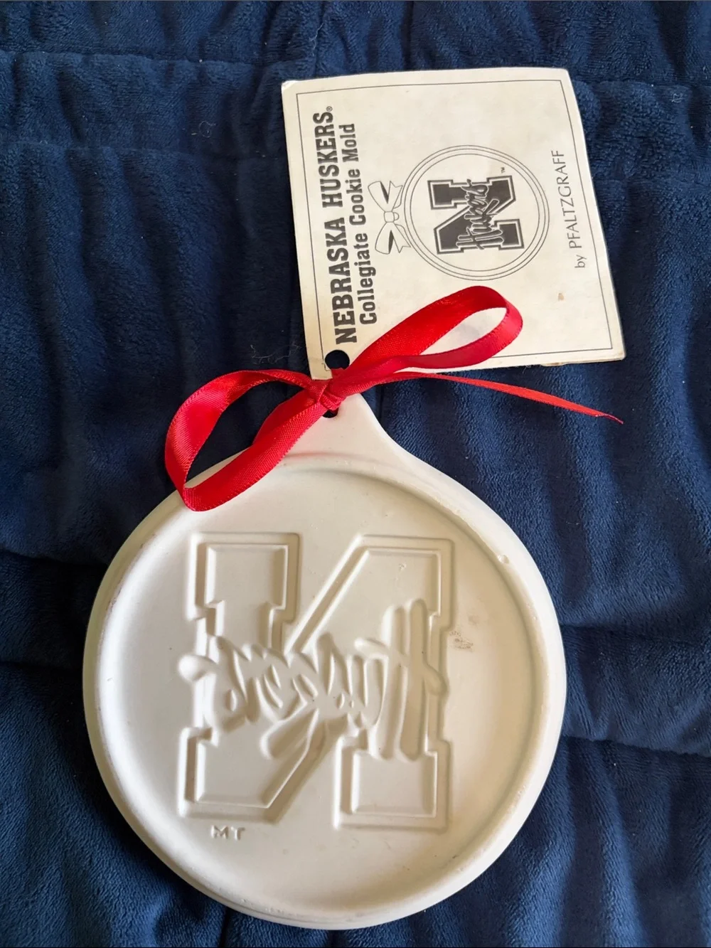 Pfaltzgraff White Nebraska Huskers Cookie Mold with Red Ribbon
